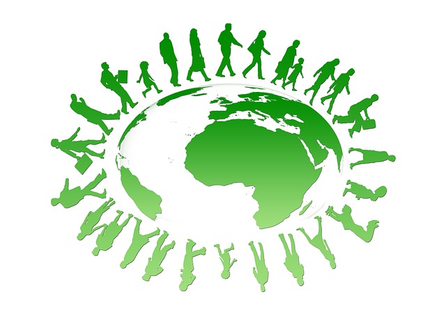 green monotone illustration of human beings circling planet earth