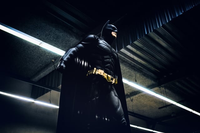 batman standing in industrial building